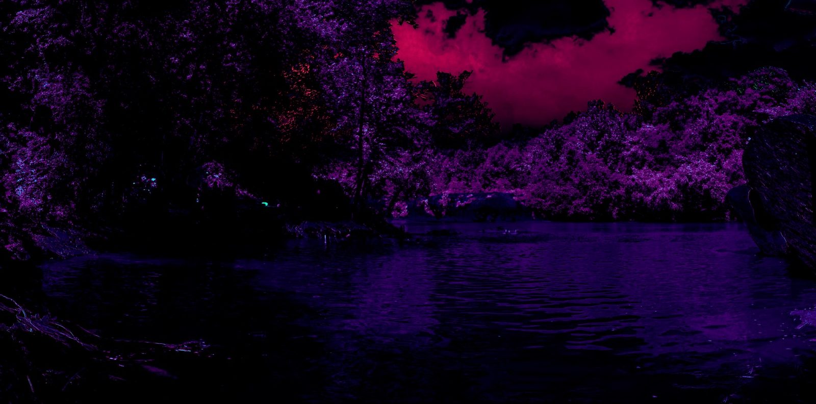 Magenta Water — Lancaster County. Creek and rock under a sky that went magenta. Infrared again. The county as a darkroom print.