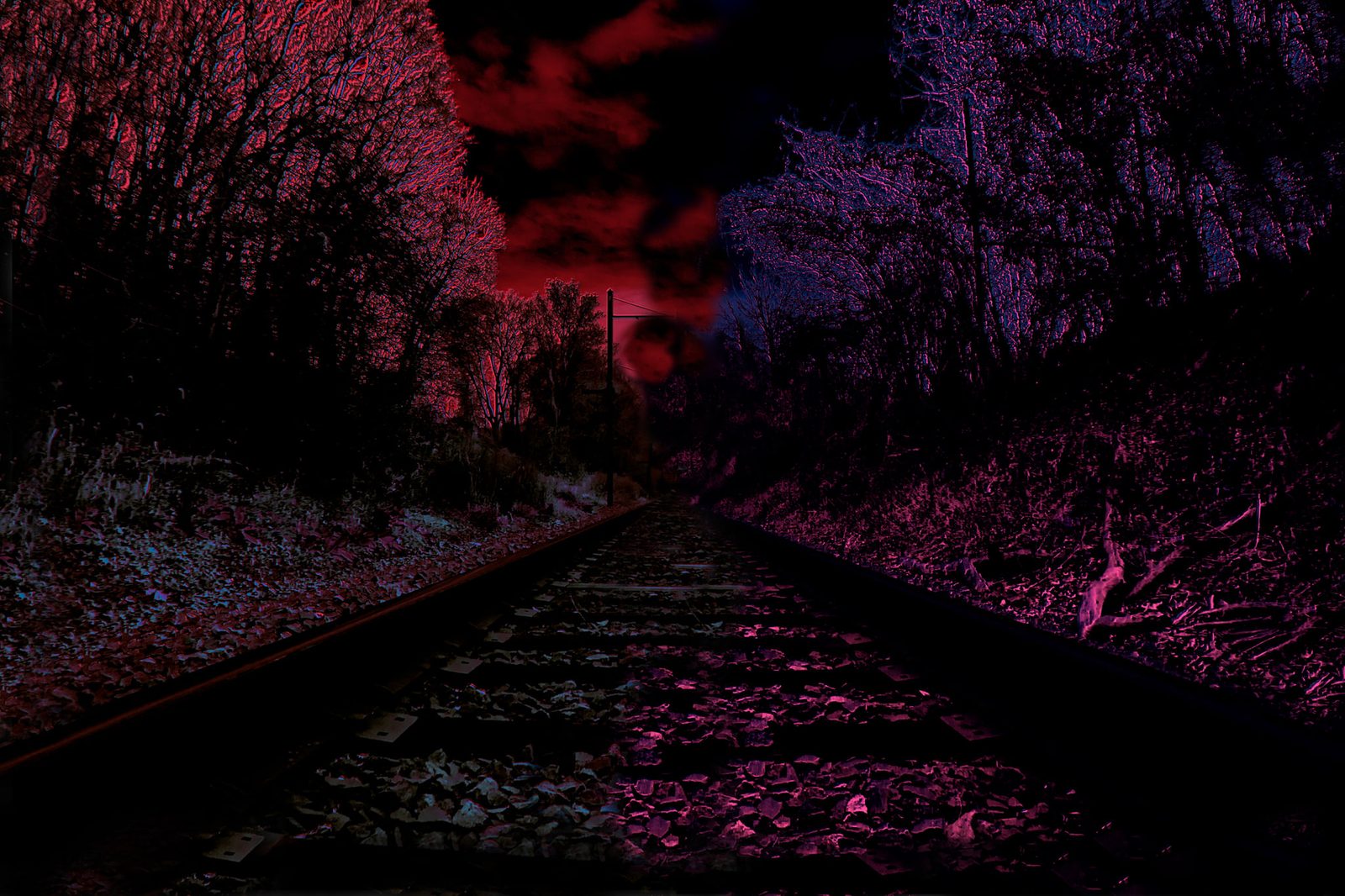 Night Line — Lancaster County. The same kind of track after dark. Red sky, purple ballast, one vanishing point. Color graded until the rails look like a wound.
