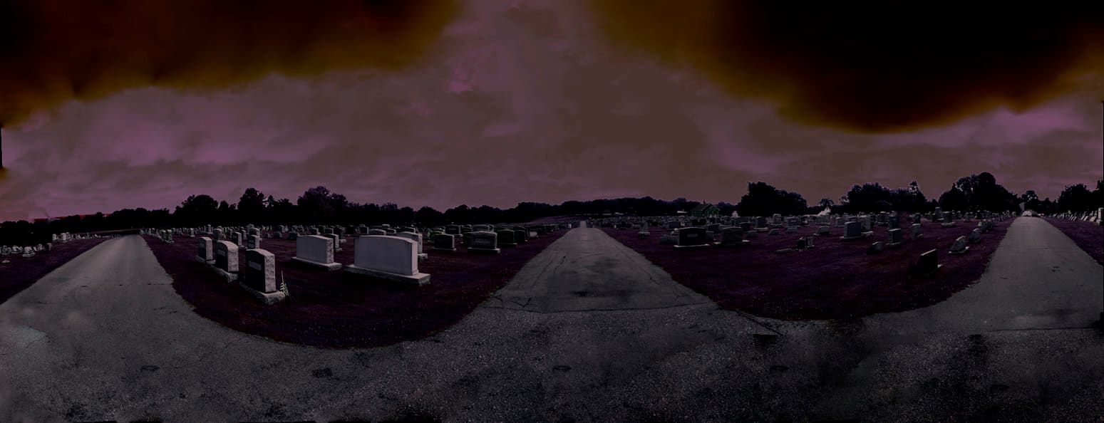 Three Roads — Lancaster County. A cemetery in panorama. Three drives, headstones in rows, a sky that went purple. The land keeping names.