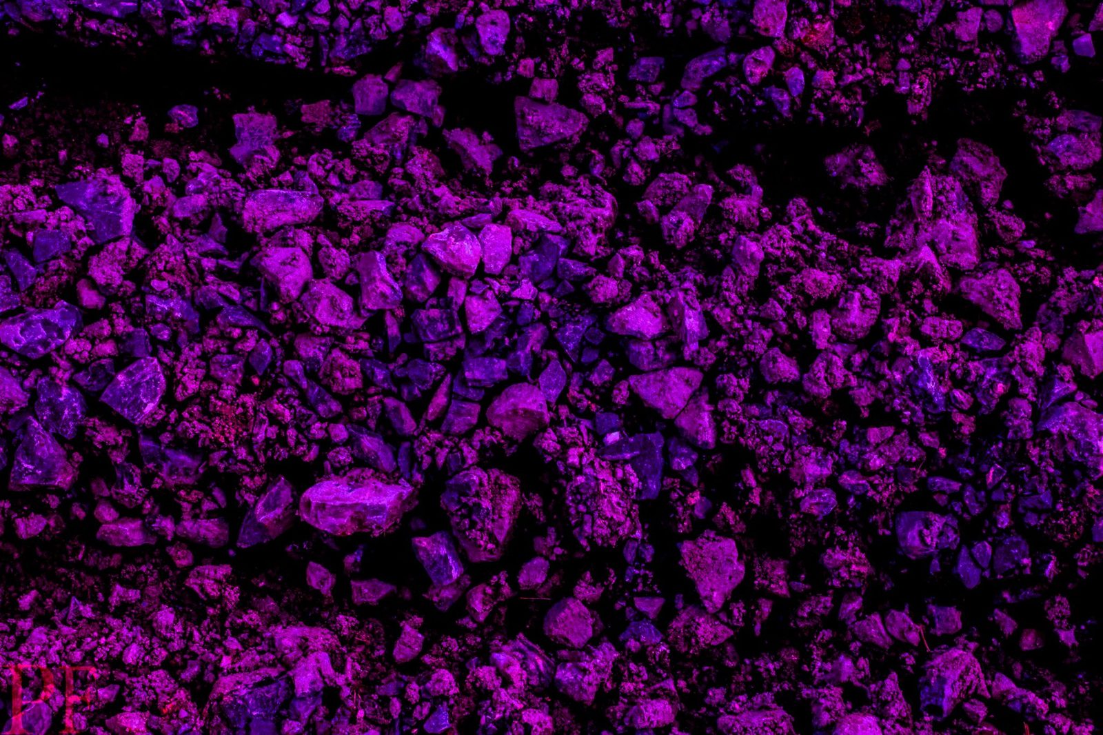 Violet Ground — Lancaster County. Gravel, close, pushed purple. The same dirt the county is built on, treated like a night sky.